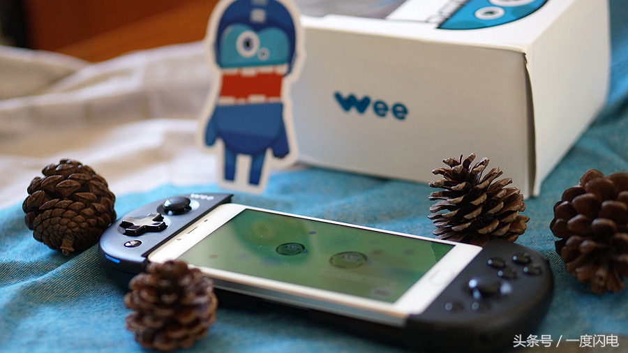 飞智wee手柄支持ios15.0,飞智游戏手柄wee拉伸手柄