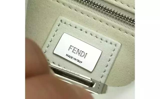 magicking包包怎么辨别真伪,蔻驰京东自营店的包包怎么查真伪