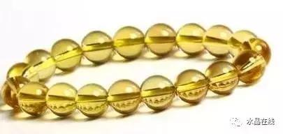 黄水晶千手观音吊坠真假,纯净体黄水晶怎么辨别真假