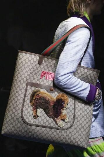 gucci和ysl有什么共同点,gucci狗年限定