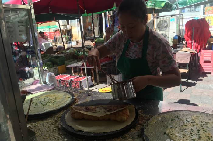 天津煎饼果子历史背景来历传说,天津煎饼果子的故事