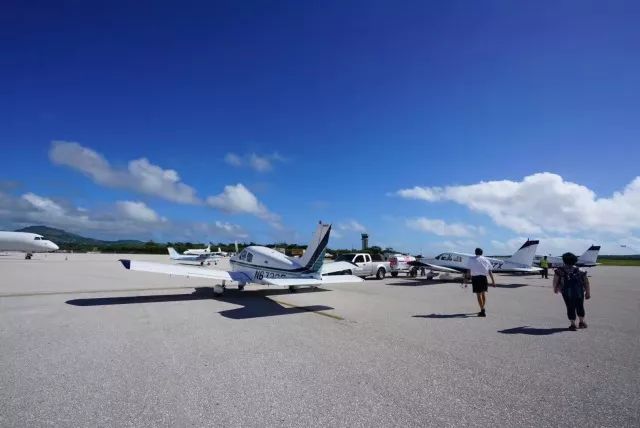 上午在广州捂白过严冬,下午在塞班岛放肆晒黑