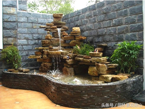 小型假山制作过程的小视频,小型假山鱼池制作视频