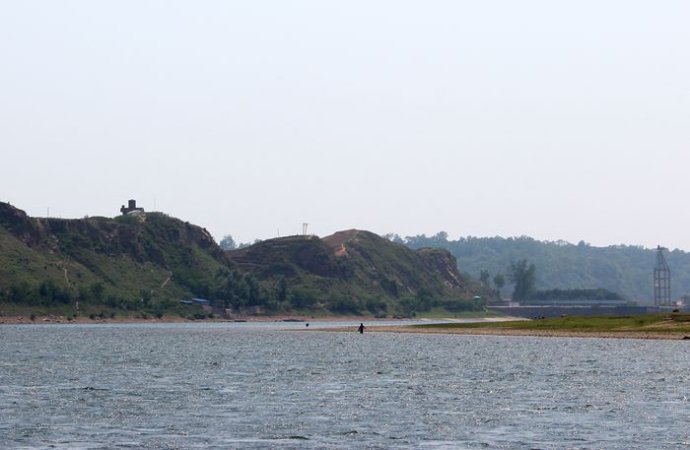 中朝边境美丽的风景,中朝边境桃花盛开的地方