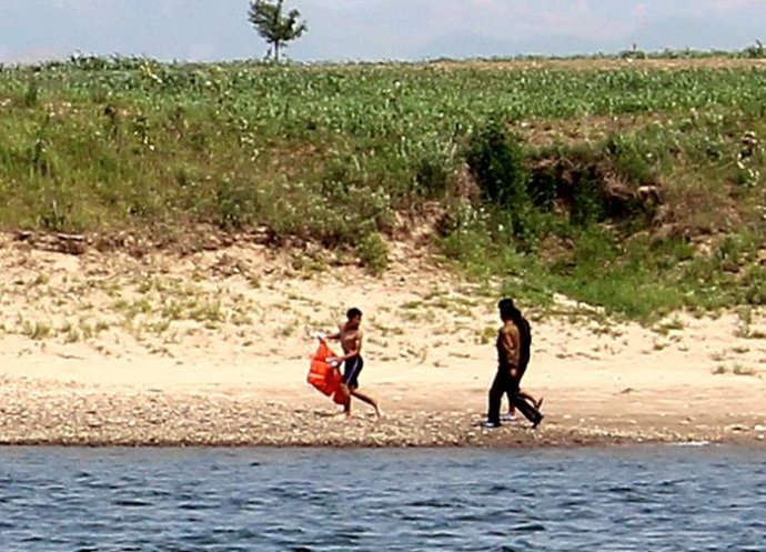 中朝边境美丽的风景,中朝边境桃花盛开的地方