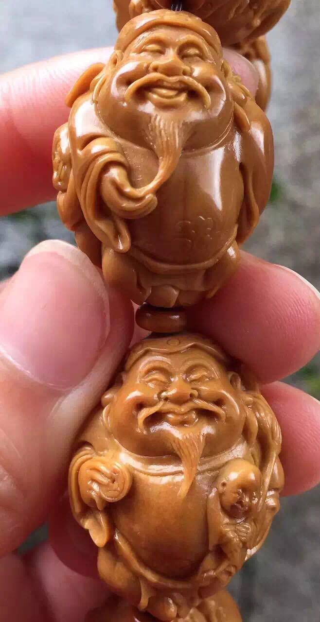 橄榄核雕有点轻怎么处理,橄榄核雕脏了可不可以洗