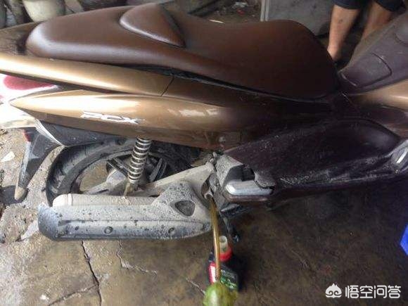 踏板洗车机油进水,踏板车机油有水怎么回事