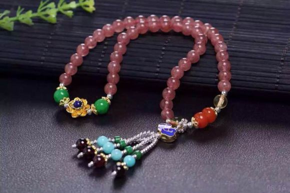 草莓晶手串的功效与作用,草莓晶的功效和寓意