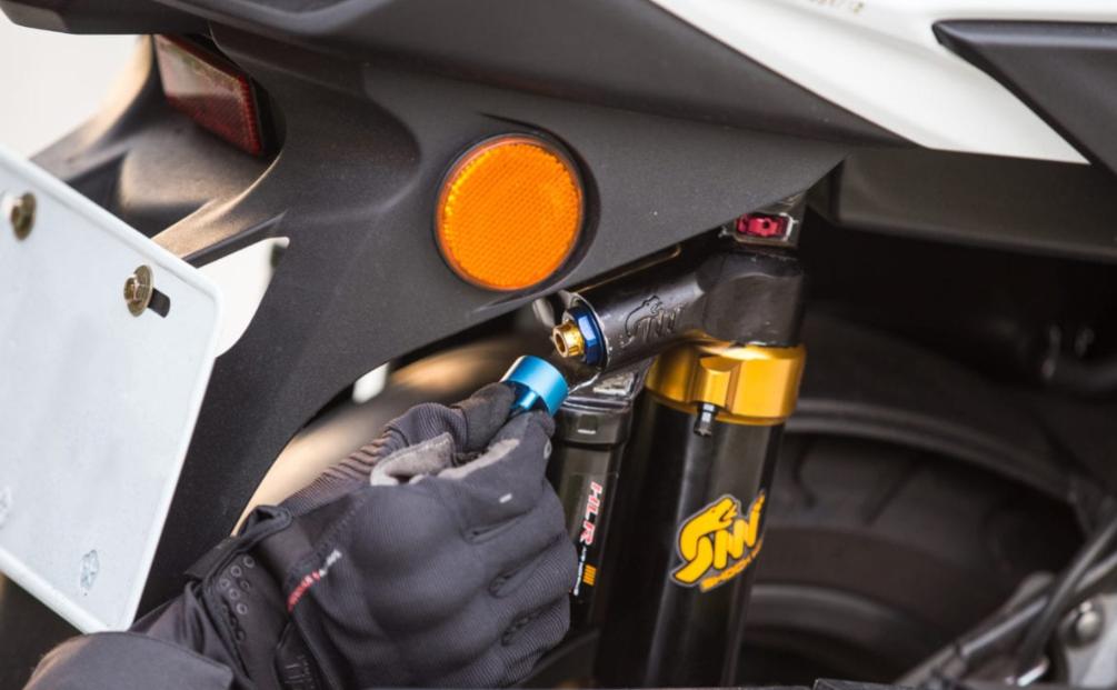 小猴子摩托车后减震怎么调节,踏板摩托车的后减震怎么调节