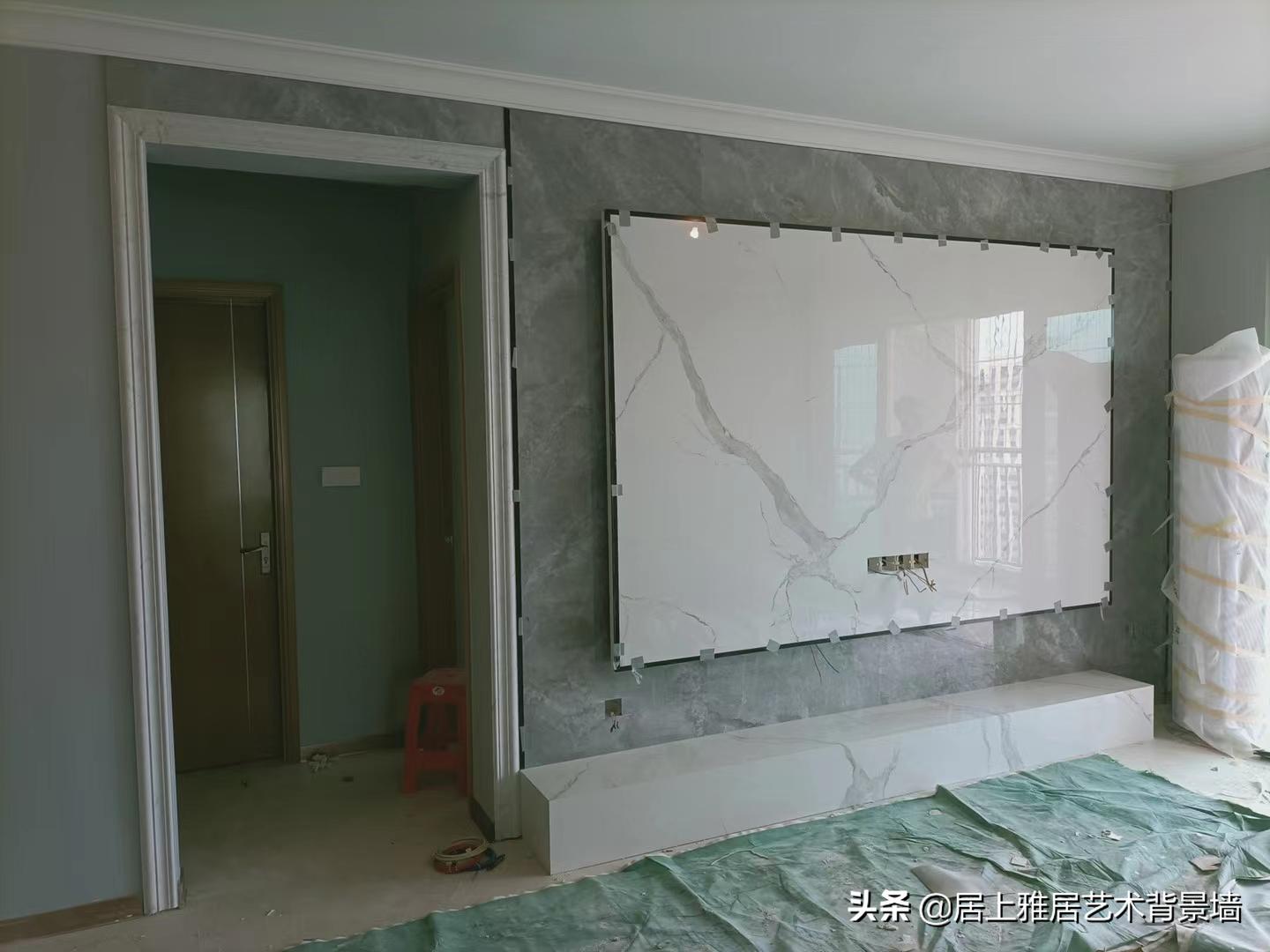 电视背景墙是岩板好还是大理石好,岩板电视背景墙价格多少钱一平米