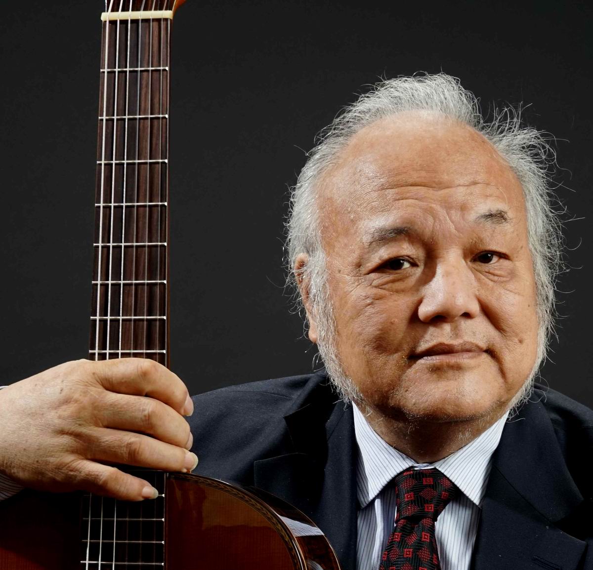 民国至今父子两代都是吉他高手,80年代一把好吉他能买间门脸房