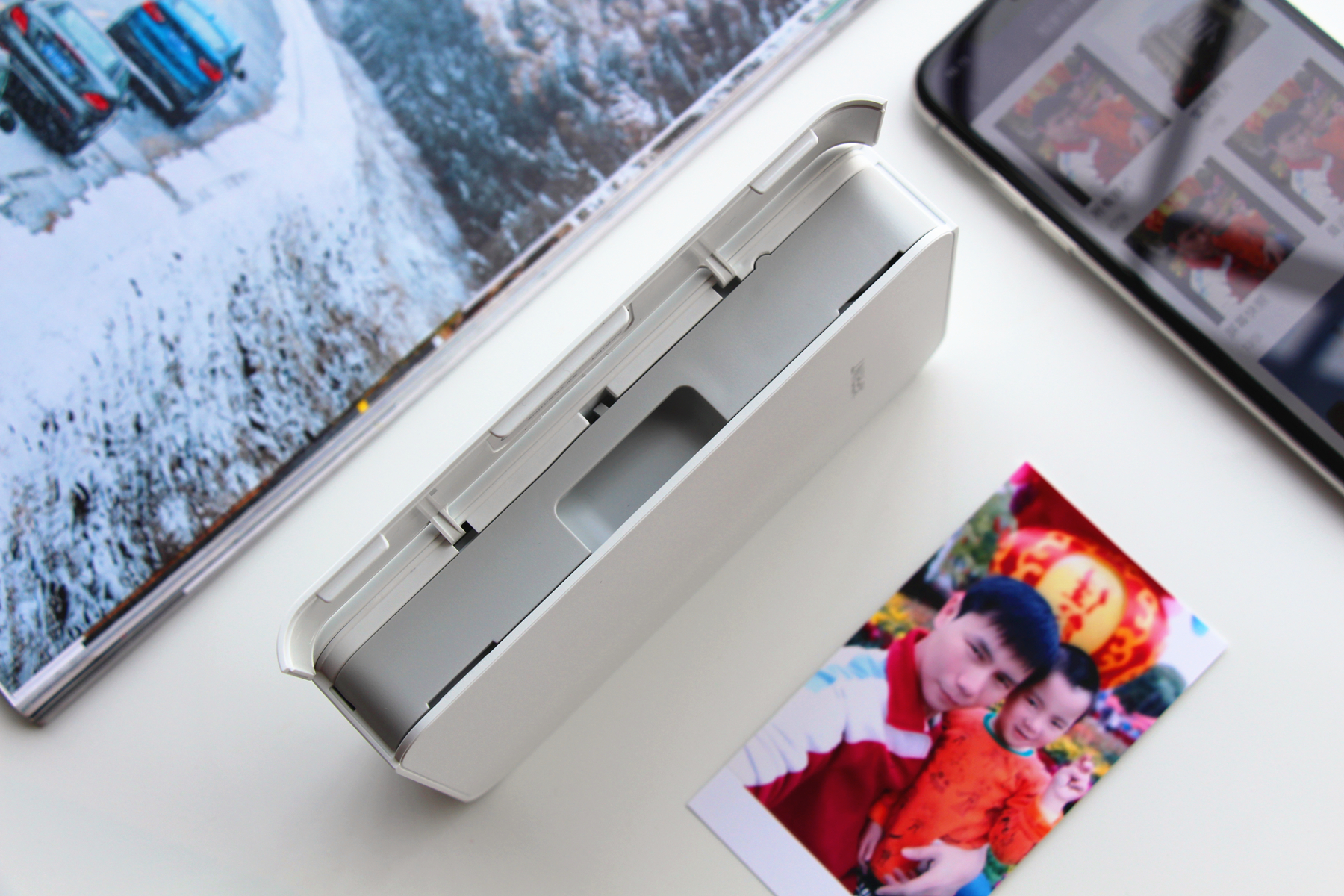 用照片纪念成长难忘时刻，极印手机照片打印机评测