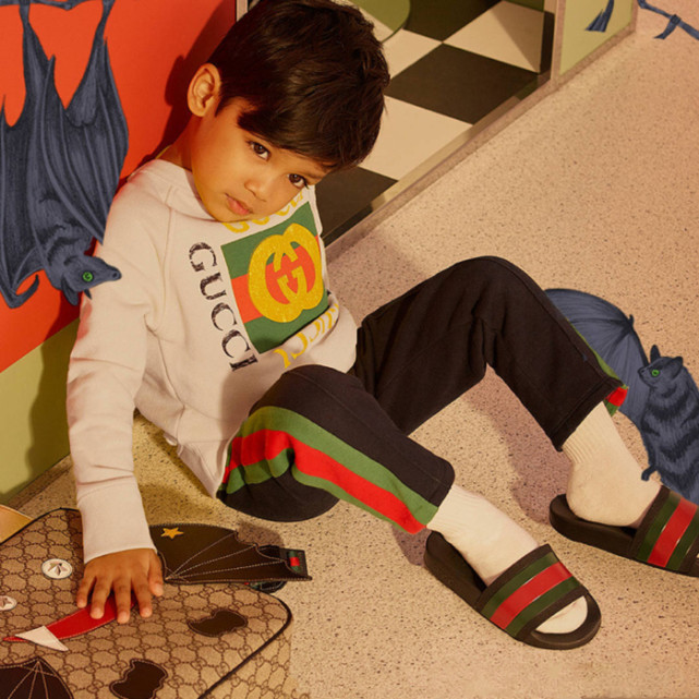 古驰品牌的风格和设计理念 (古驰的童装要多少钱一套)