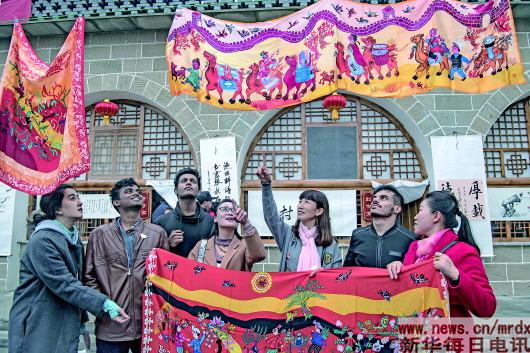 新华每日电讯｜踩着安塞腰鼓激昂的鼓点，伴着信天游高