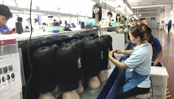 被中国市场冷落的假发,是非洲的刚需,有“黑黄金”之称