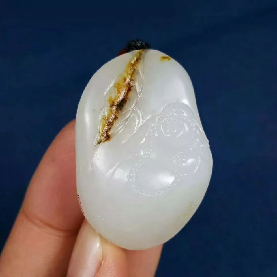 把玩和田玉和玻璃的区别,把玩和田玉生肖