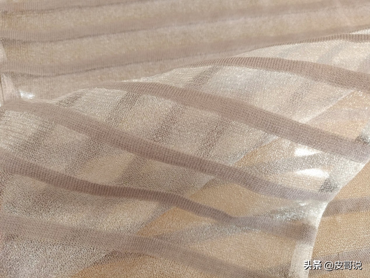 欧根纱面料是什么材质做的,欧根纱是什么质感