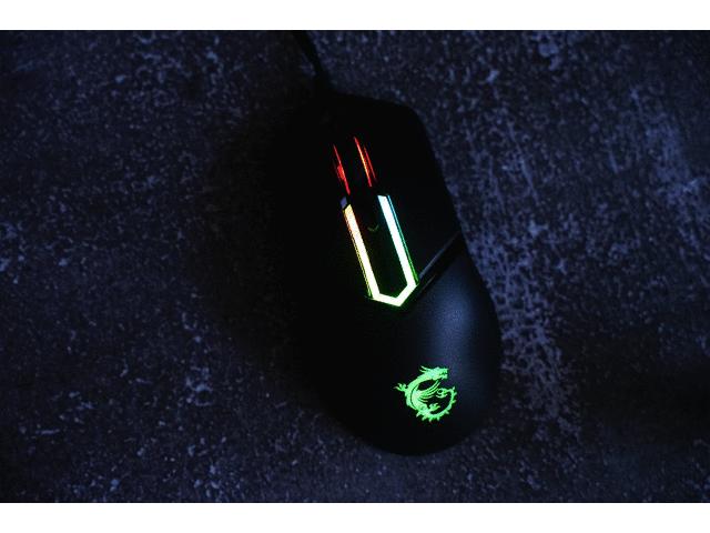 看样子就很有料，这个自带龙纹身的鼠标果然很不一般