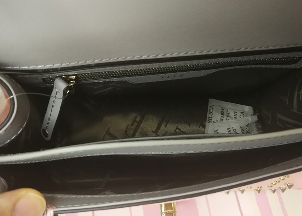 elle双肩铆钉女包,elle铆钉包