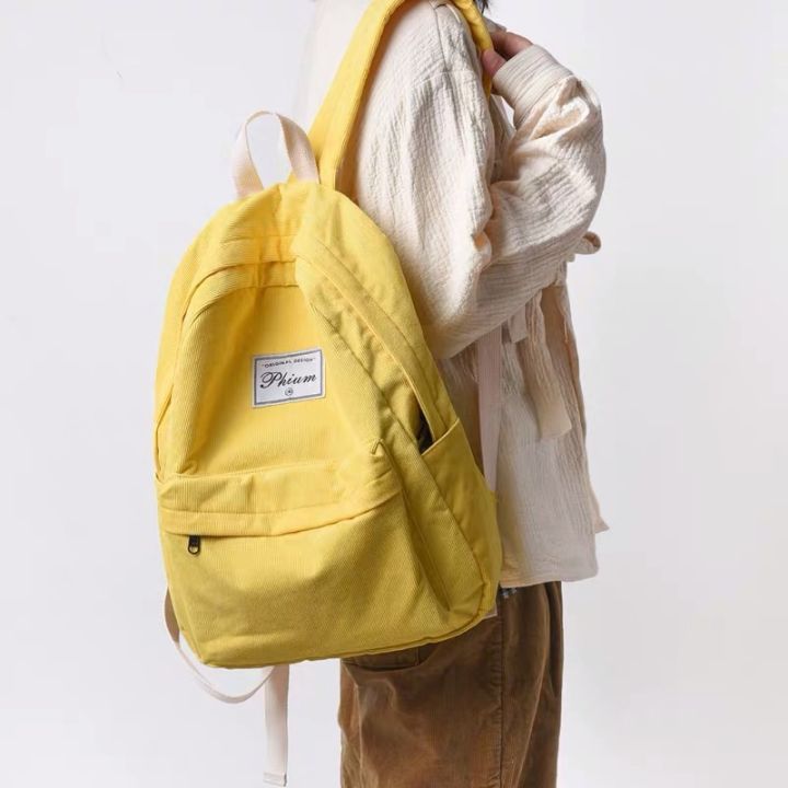 黑色抽绳双肩包出街百搭,双肩包出街推荐大学生小巧