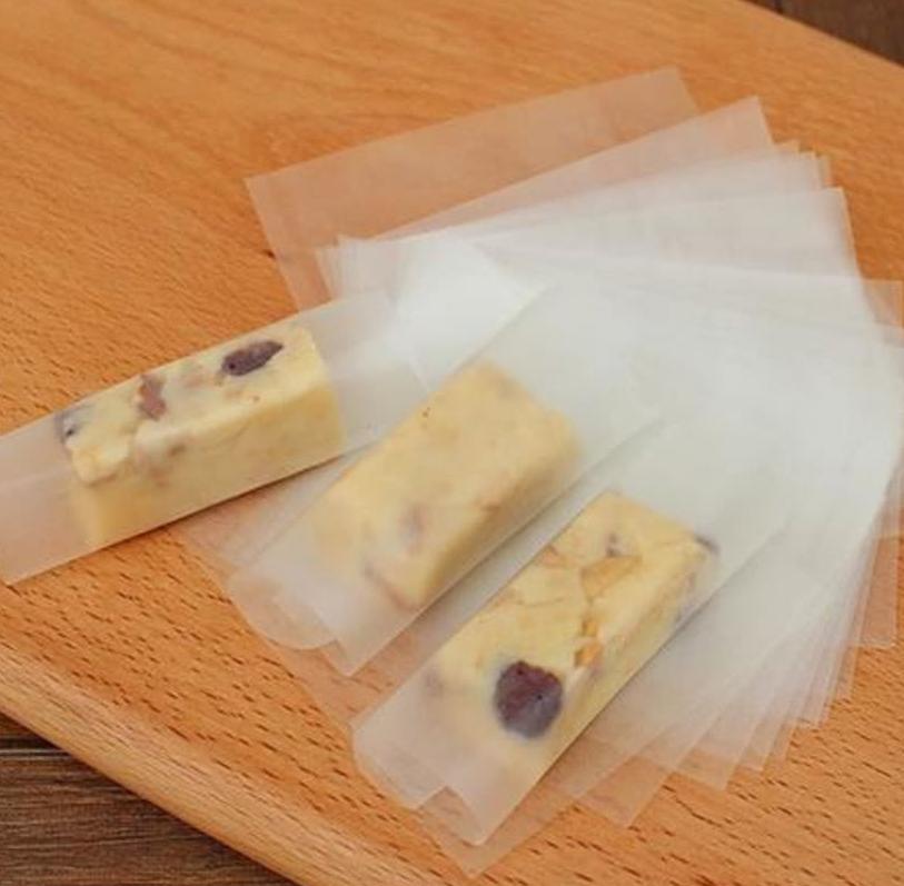 糖果上面入口即化的纸膜是什么,糖果外面粘的糖纸怎么去除