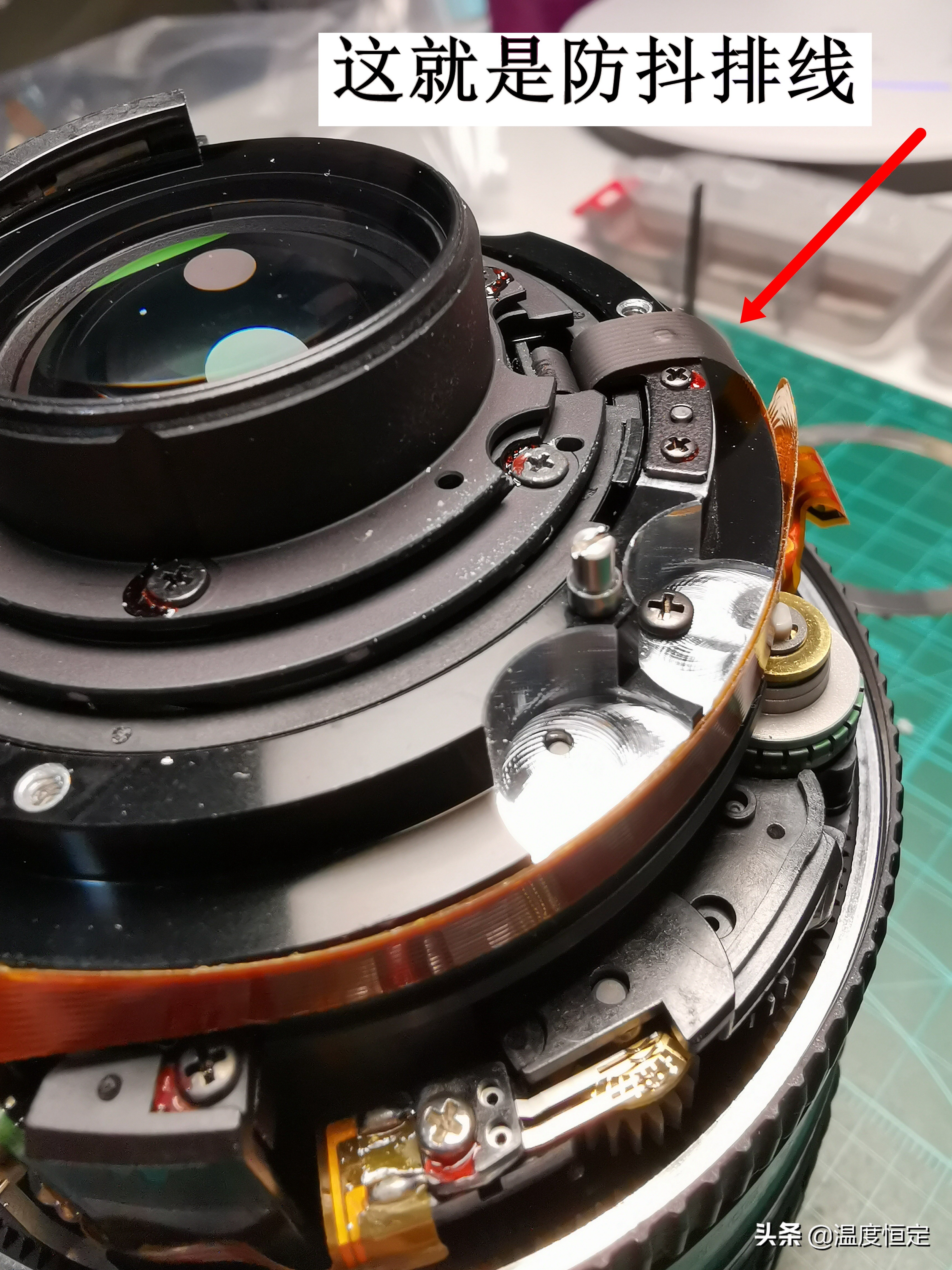 尼康镜头防抖打开一直响,尼康24-120镜头防抖怎么开