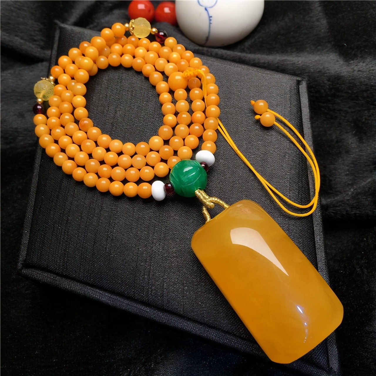 鉴别蜜蜡真假的10种方法,怎么鉴别真假蜜蜡最简单的办法