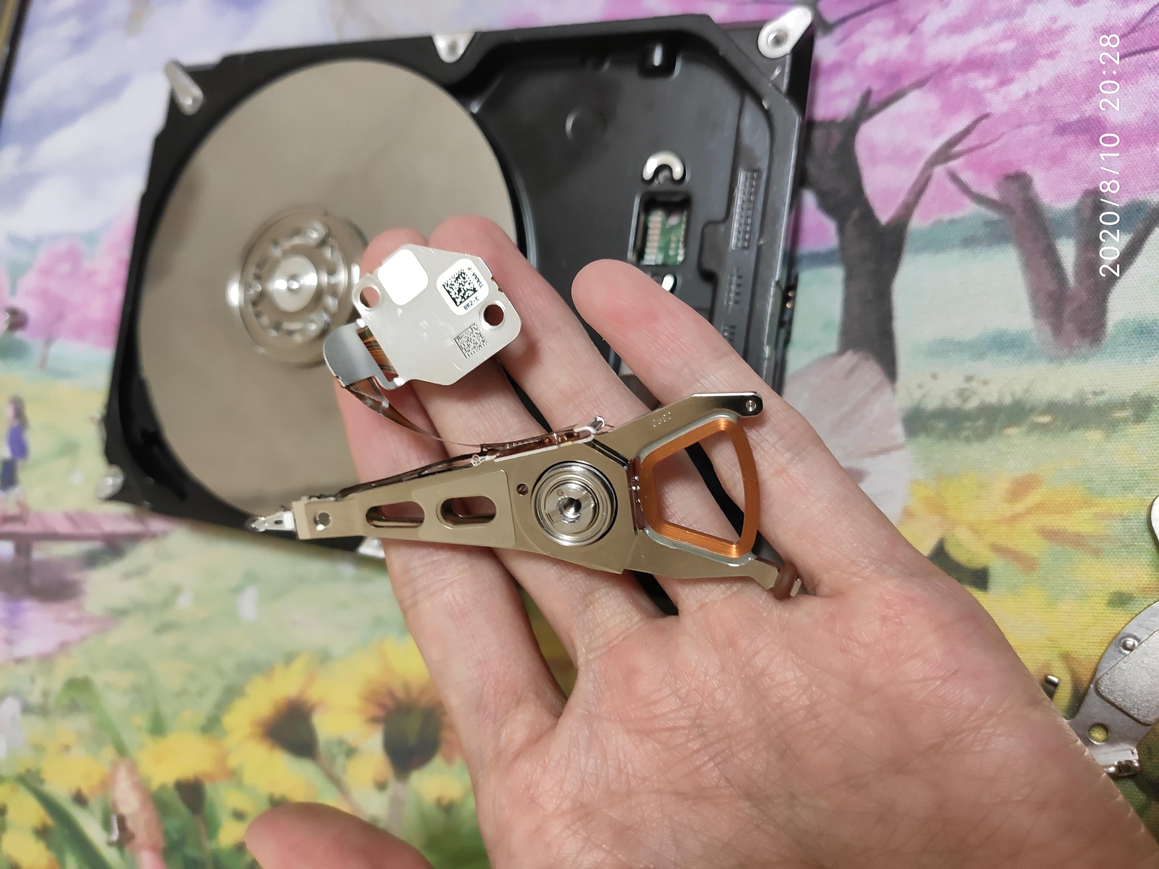 移动硬盘拆解做笔记本硬盘,电脑硬盘中的磁盘拆解