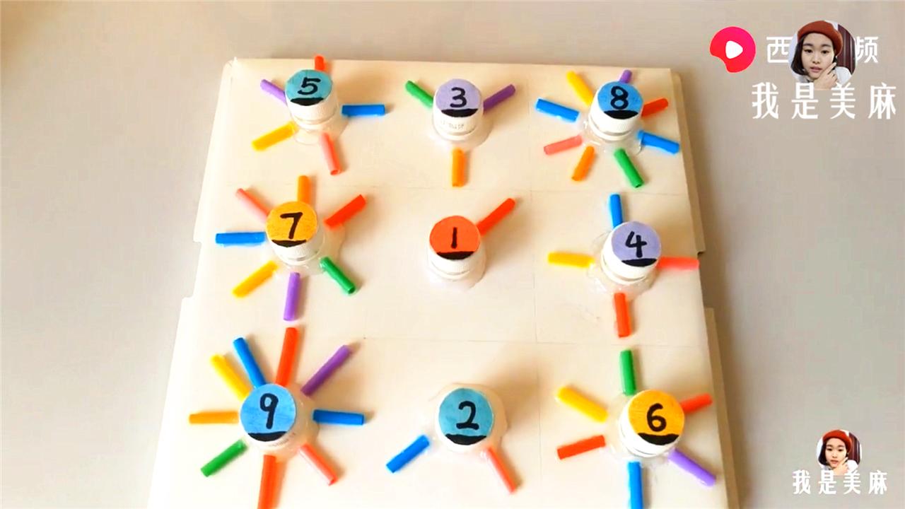 幼儿益智手工玩具制作塑料瓶,废物儿童益智玩具制作