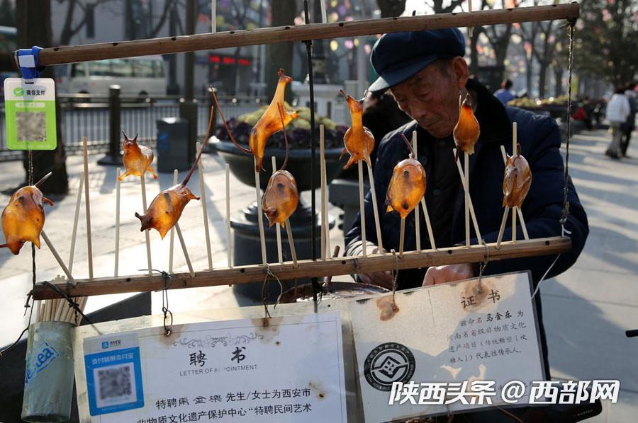 75岁男子吹糖人,75岁老人吹糖人