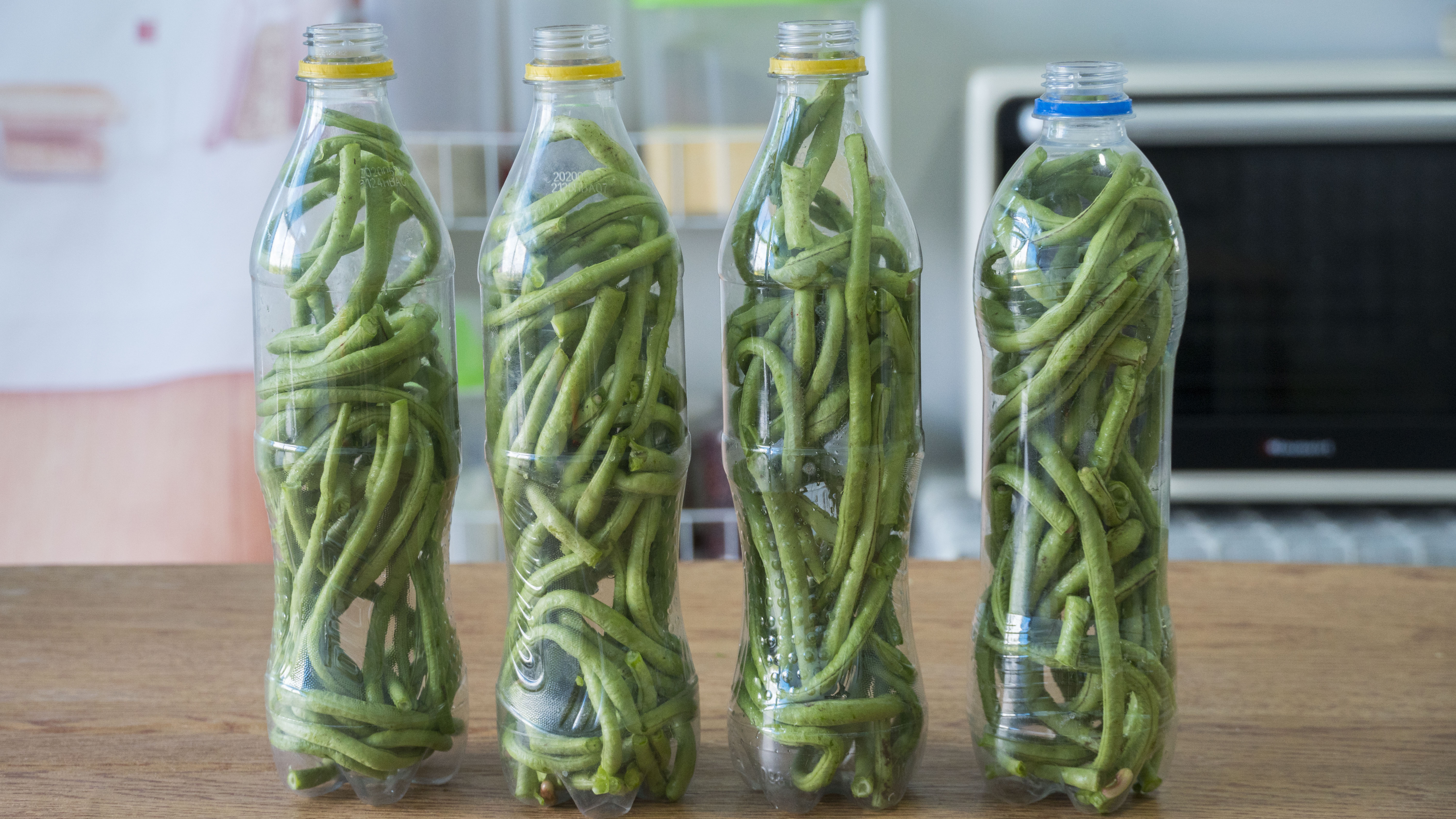 水瓶做酸豆角的方法,矿泉水瓶腌豆角的家常做法
