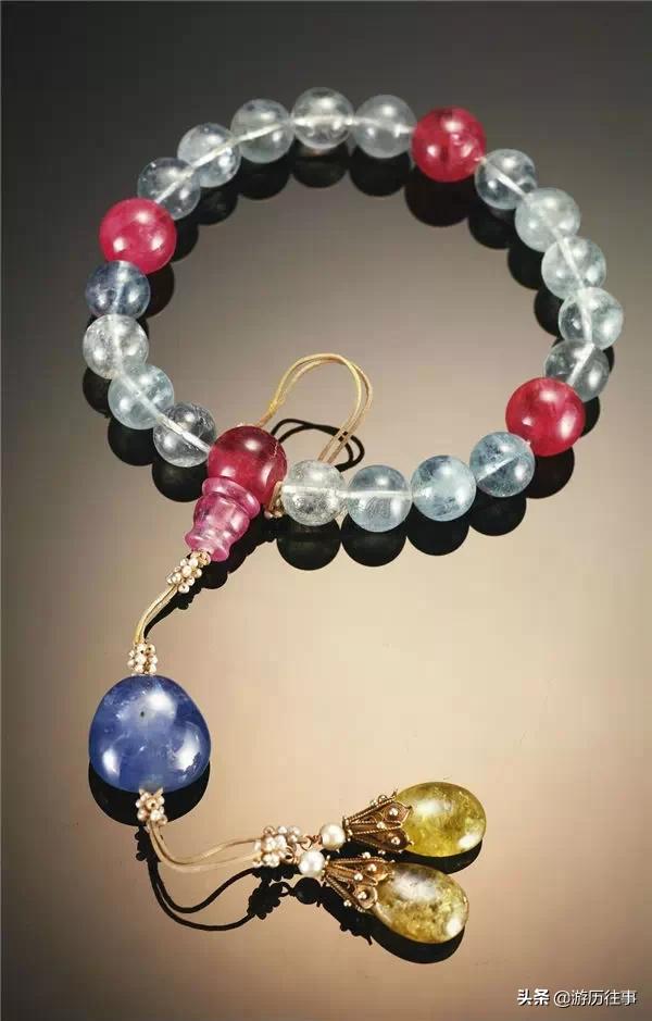 清朝皇帝官员为什么都戴一串珠子,清朝皇帝和官员都戴什么样的佛珠