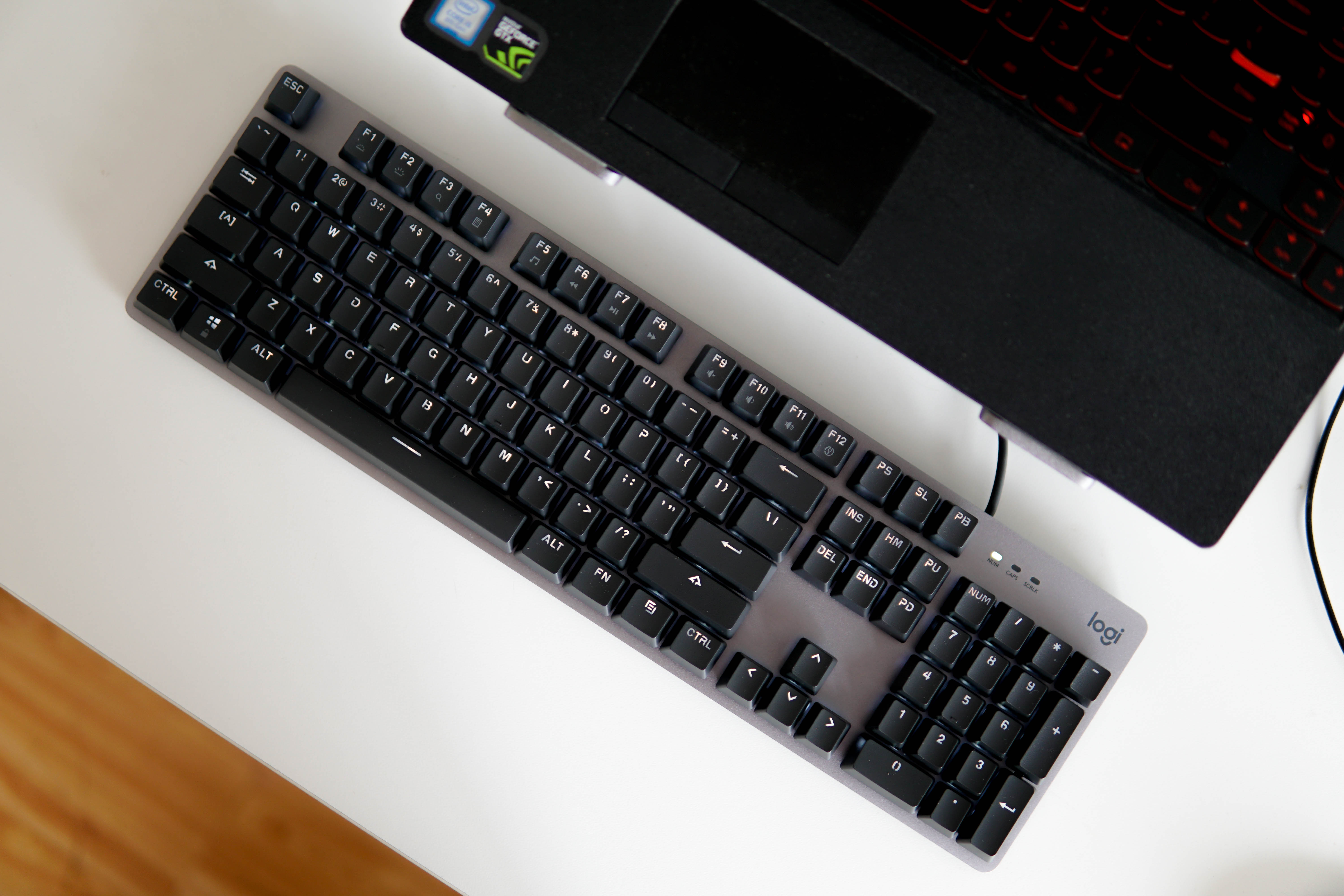 罗技k845ttc和cherry红轴哪个好,罗技k845键盘打游戏测评