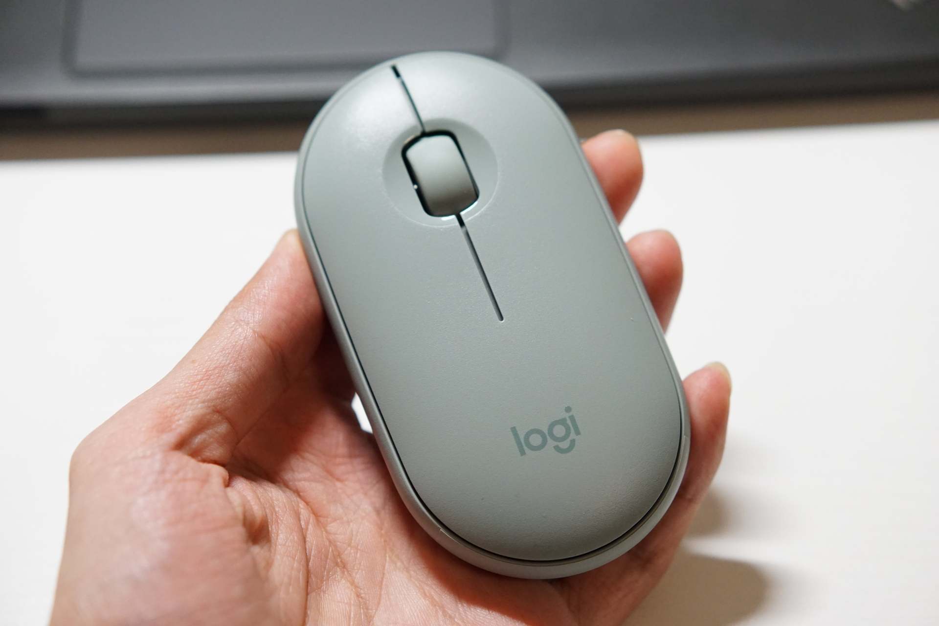 罗技无线鼠标pebble怎么切换蓝牙,罗技鼠标pebble如何连ipad