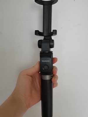华为有线自拍杆的使用方法及操作,华为手机用自拍杆的使用方法图解