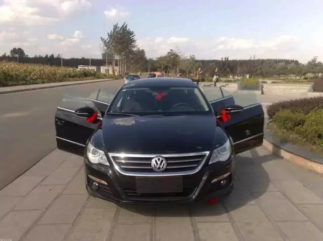 新车轮胎系红布条是什么意思,新车要绑红带在什么部位