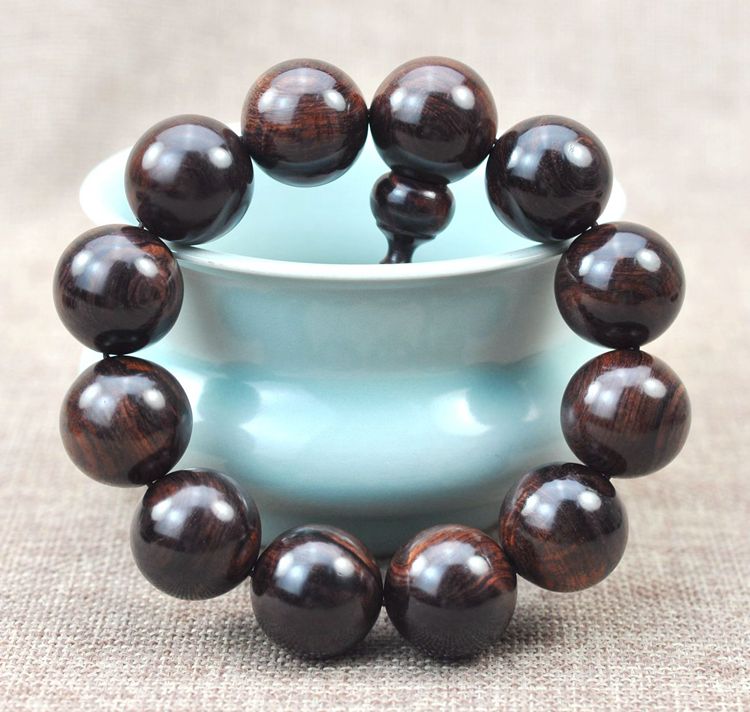 海南黄花梨芝麻点如何鉴别图,怎么鉴别海南黄花梨手串真假