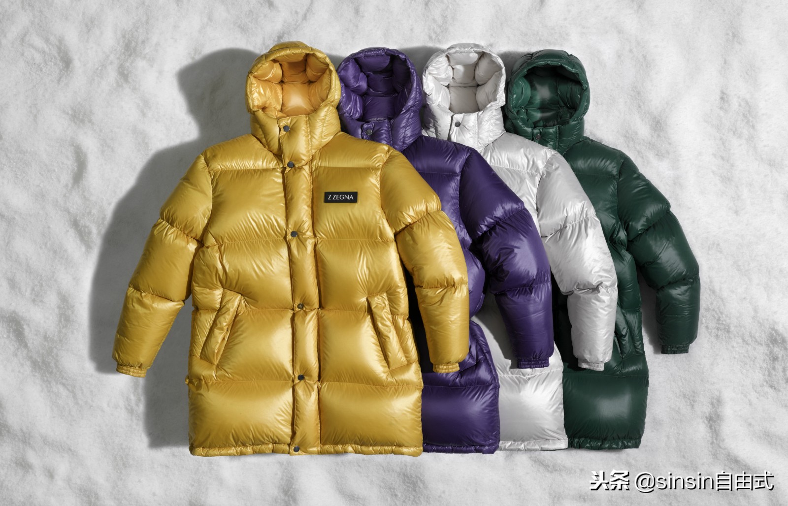 「时尚」1组机刻花纹行李包几件尼龙羽绒夹克衫还有3项跨界合作款