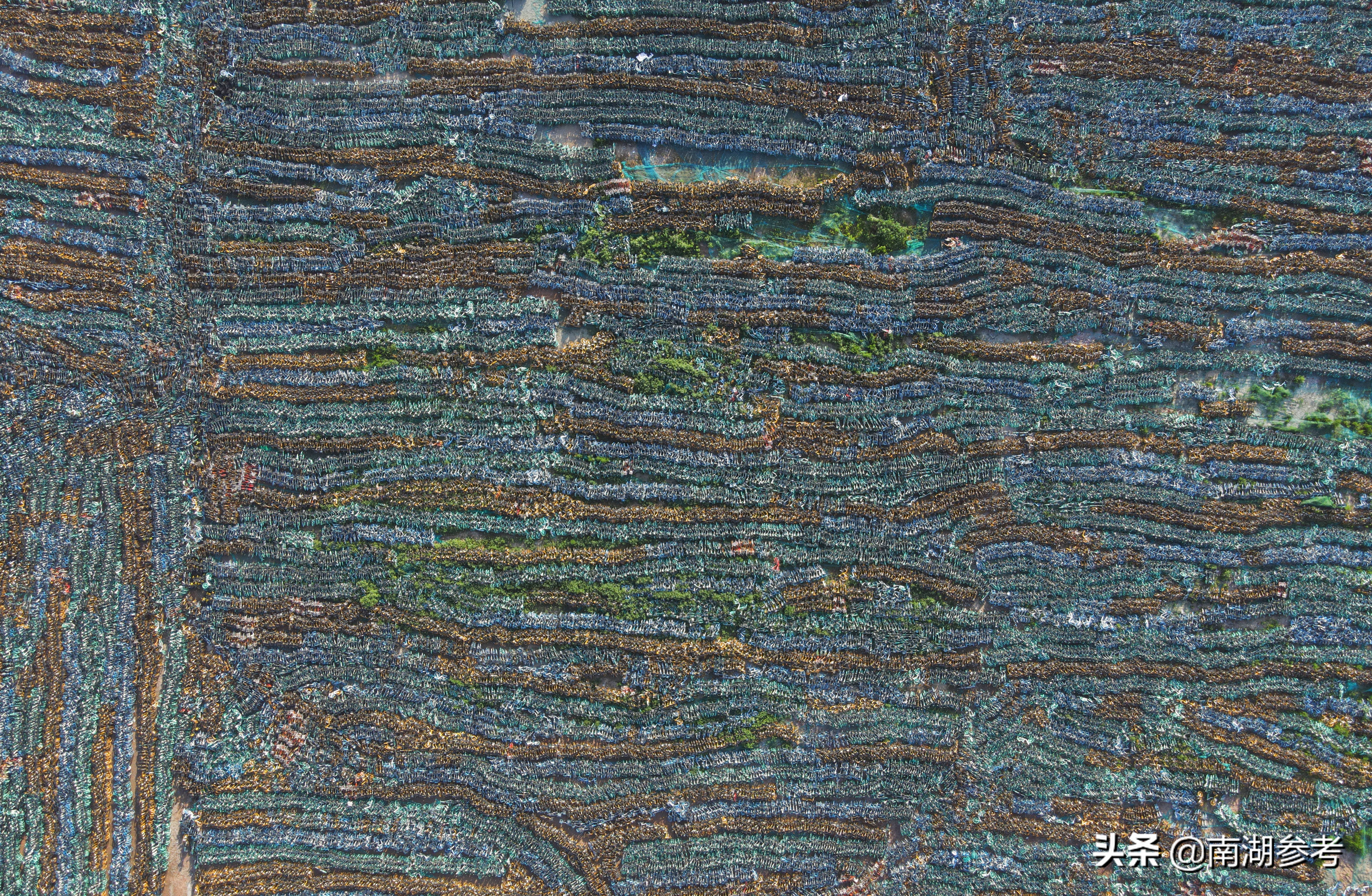 西安共享单车坟场,几十万辆共享单车坟场