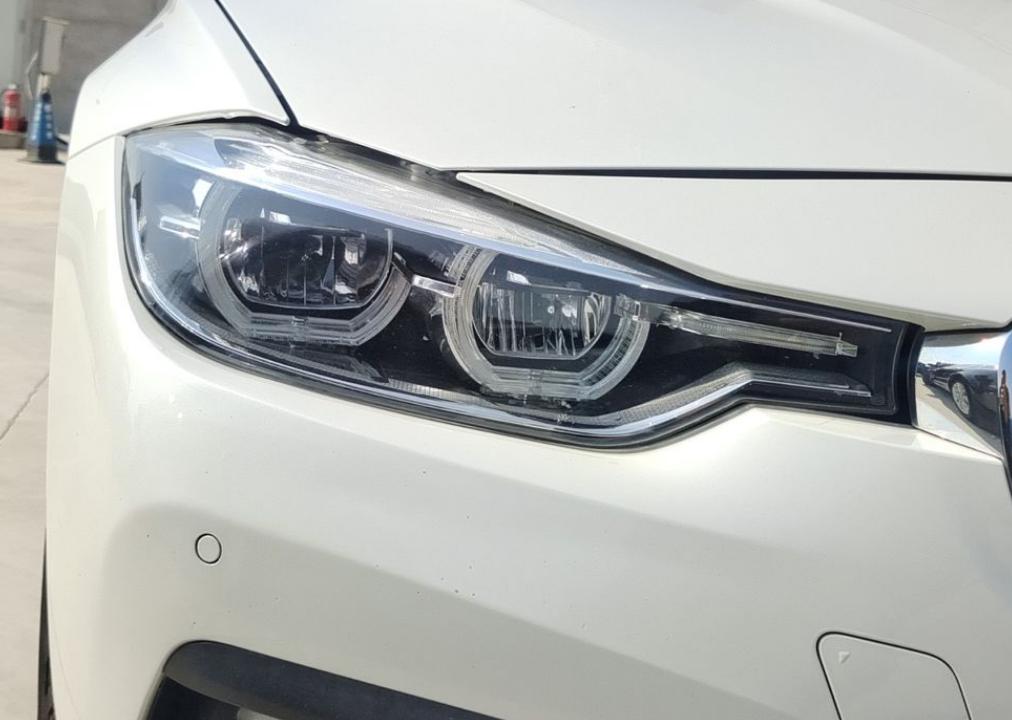 开了5年的宝马3系顶配能卖多少,开了3到5年的宝马