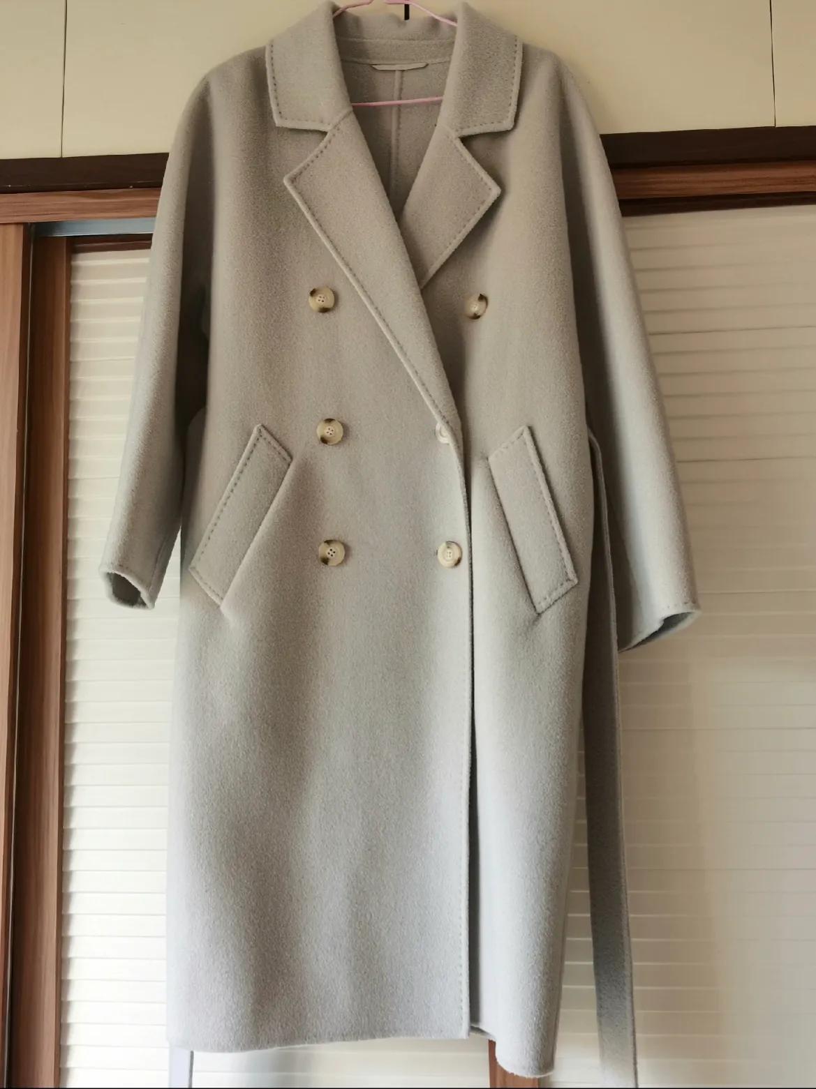 羊绒大衣起静电是不是假的,双面羊绒大衣吸腿有静电怎么回事