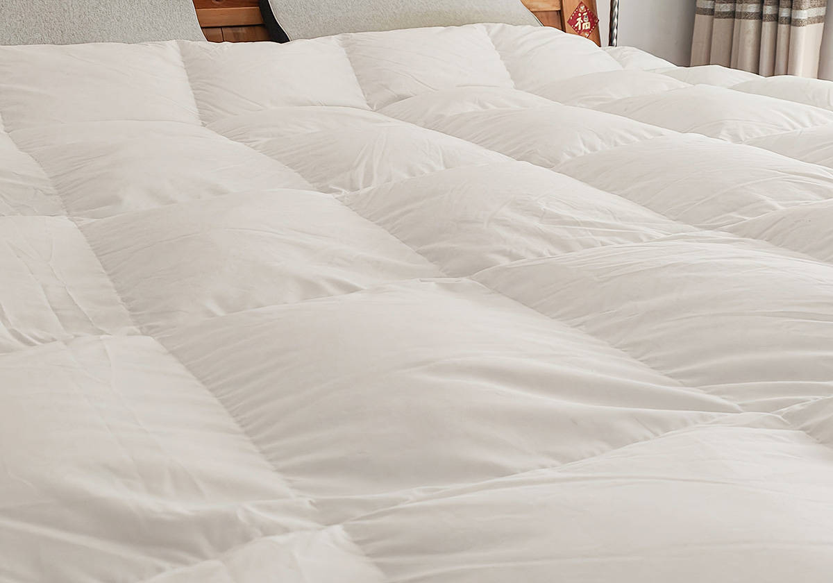 冬天盖鹅绒被暖和吗,夏天睡鹅绒被的体验