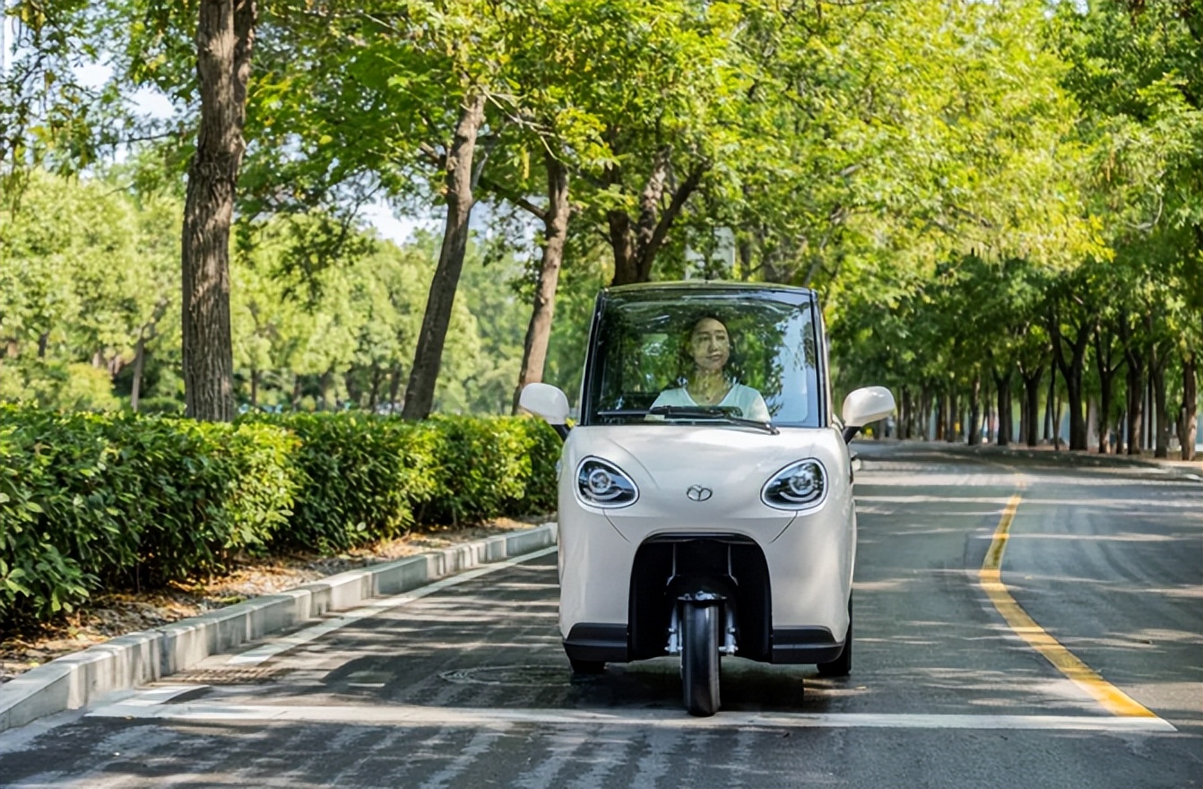 大阳载客三轮车新款,大阳封闭三轮车最新款