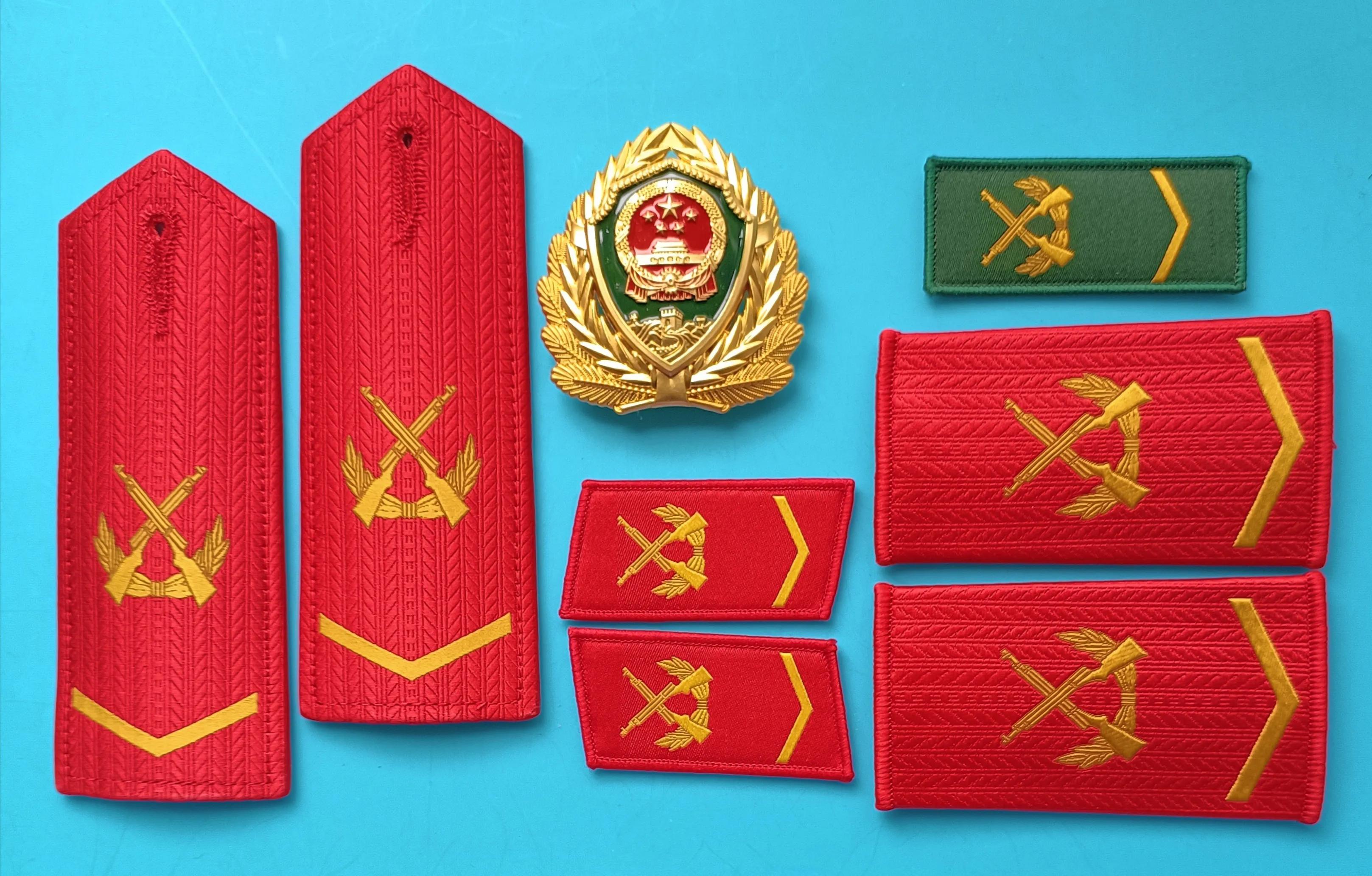 毛启国军装,毛启国警用帽徽