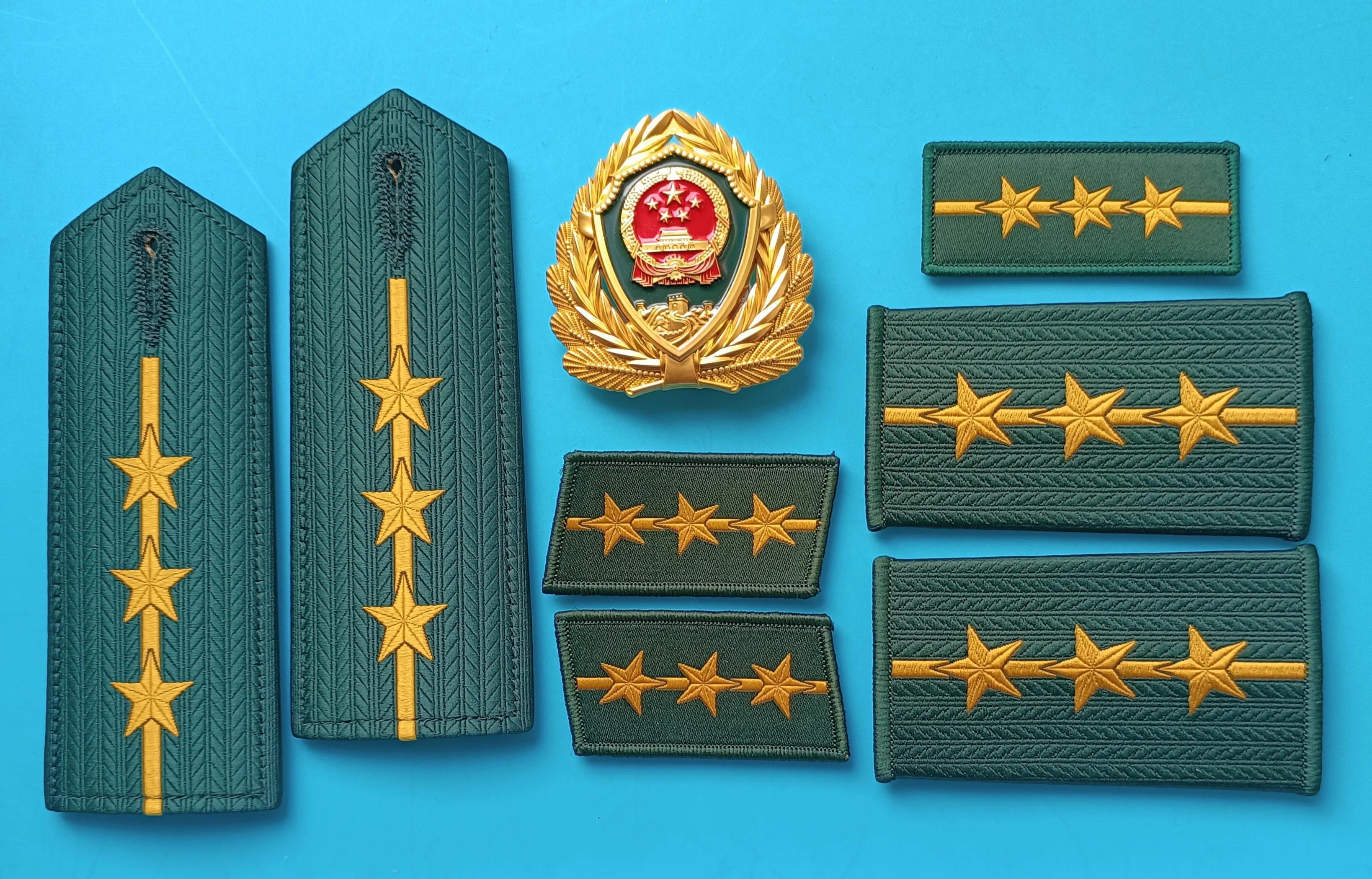 毛启国军装,毛启国警用帽徽