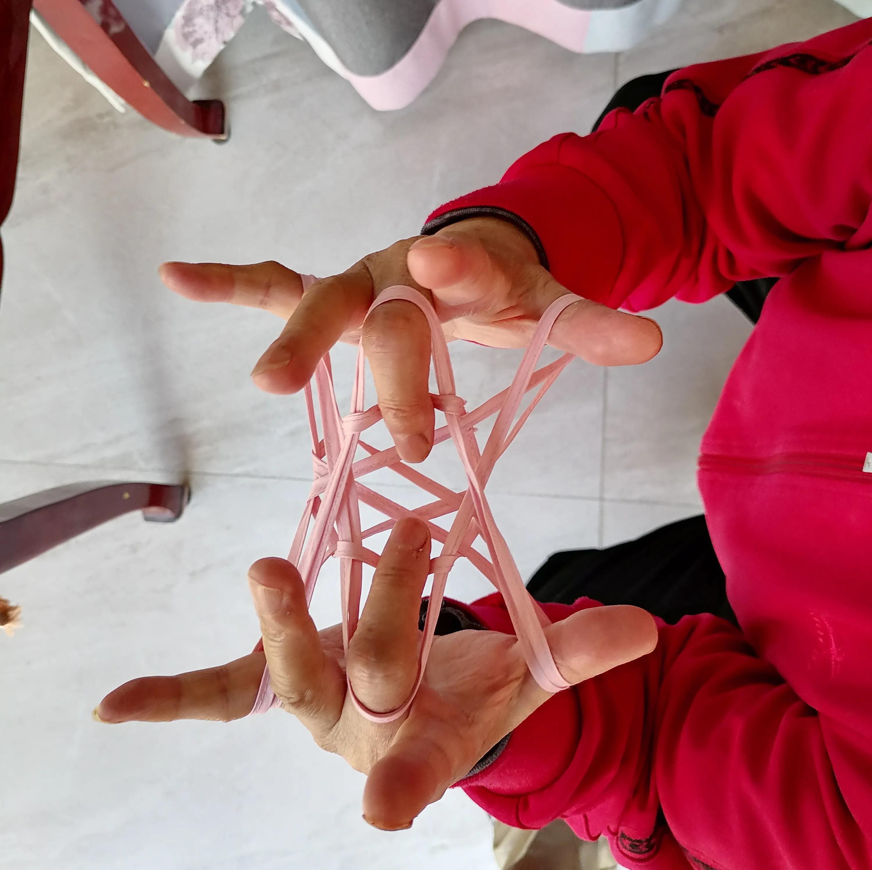 翻花绳游戏过程100字,两人玩的翻花绳游戏小技巧