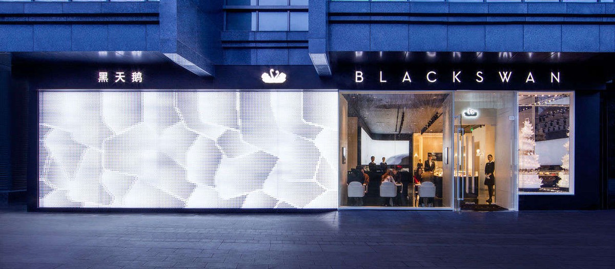 好利来老板罗红和江一燕,好利来老板的事迹