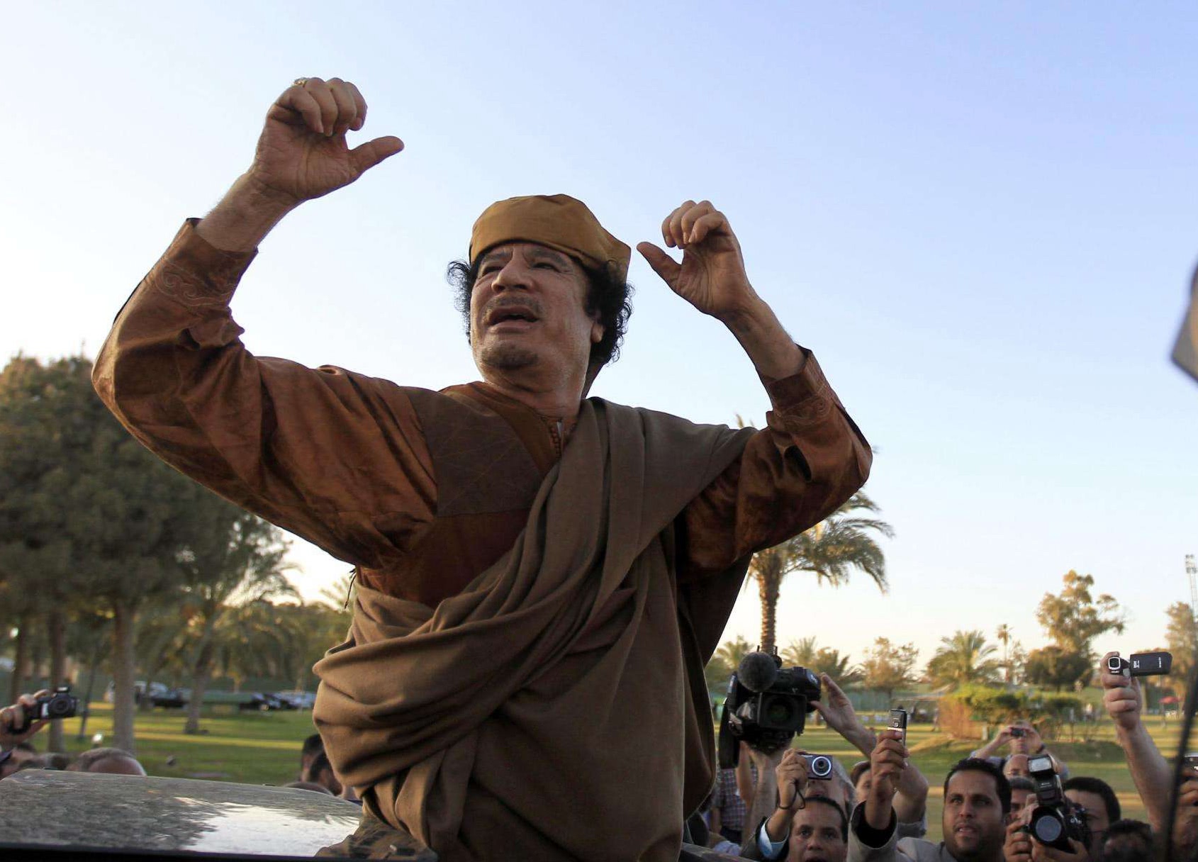 卡扎菲遗体处理,卡扎菲死后被葬在什么地方