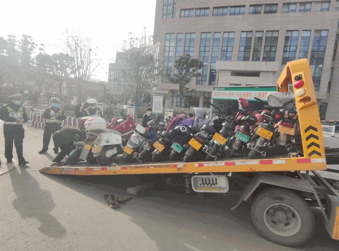 南阳电动车私加篷伞专项整治行动,南阳交警开展春雷行动