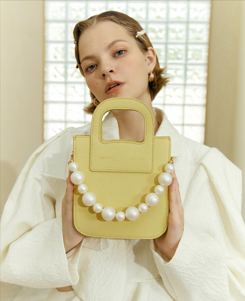 40到50岁女人适合背什么包包,40岁女性背什么牌子的包包